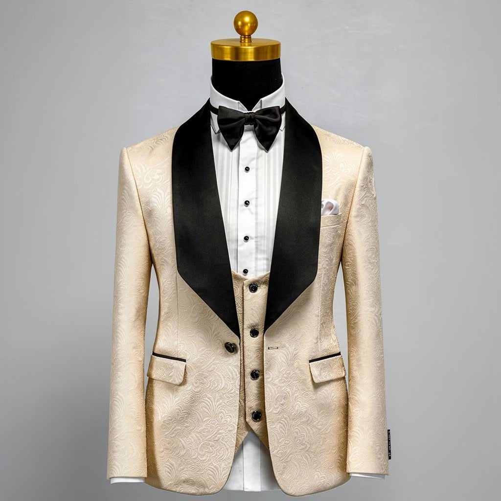 Beige tuxedo with black lapels on a mannequin against a gray background