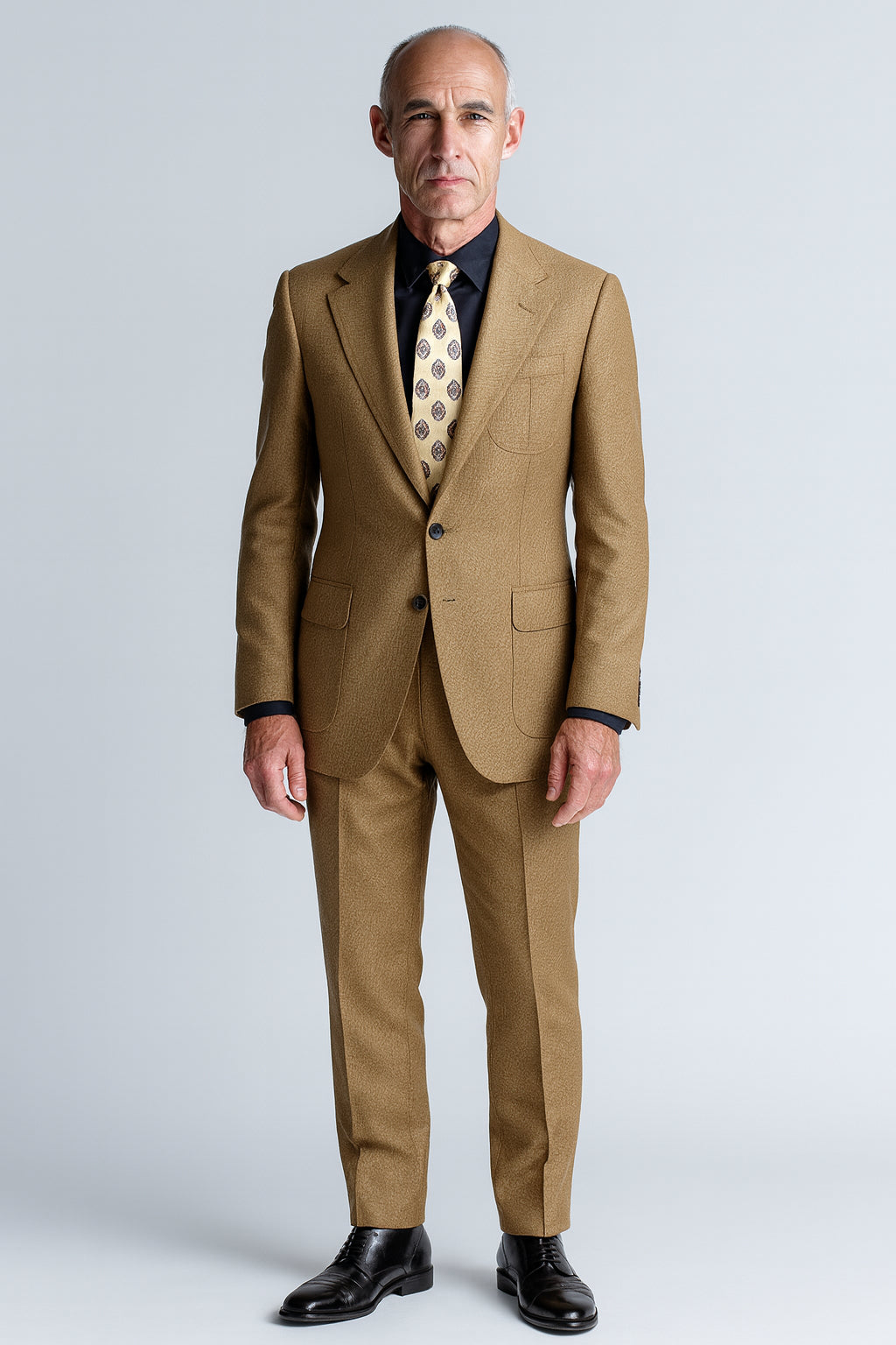 Man wearing a brown suit with a white background