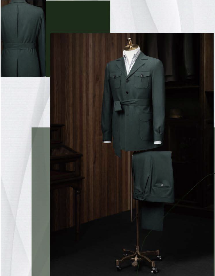 A green casual safari jacket and matching green trousers displayed on a mannequin, with the jacket featuring a notched lapel, patch pockets, and dark brown buttons.