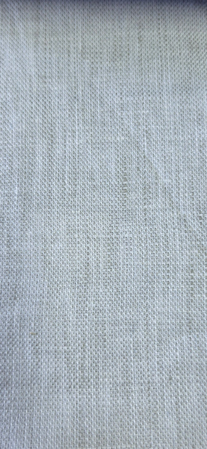 A close-up of a light Stone woven fabric swatch with a visible zigzag-cut edge, shown against a neutral background.