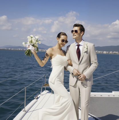 Wedding couple on a boat with a scenic background