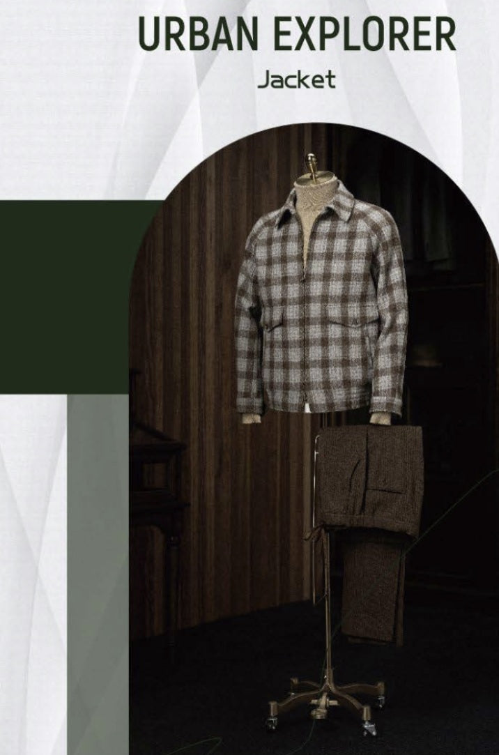 Plaid jacket on a mannequin with a dark background, labeled 'Urban Explorer Jacket'.