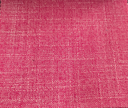 A close-up of a woven fabric texture in a vibrant pink color with subtle lighter pink and beige threads creating a subtle grid pattern.