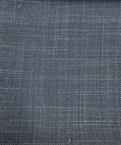 A close-up of dark charcoal gray woven fabric with a subtle blue-gray plaid pattern.