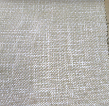 A close-up of woven fabric with a subtle plaid pattern in light beige and off-white, showing the texture and weave detail.