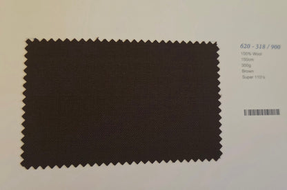 A dark brown fabric swatch with zigzag-cut edges, displayed on a light background next to printed color and specification text.