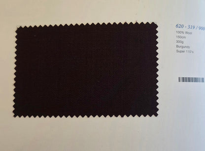 A dark burgundy wool fabric swatch with serrated edges, displayed on a white background next to printed specifications.