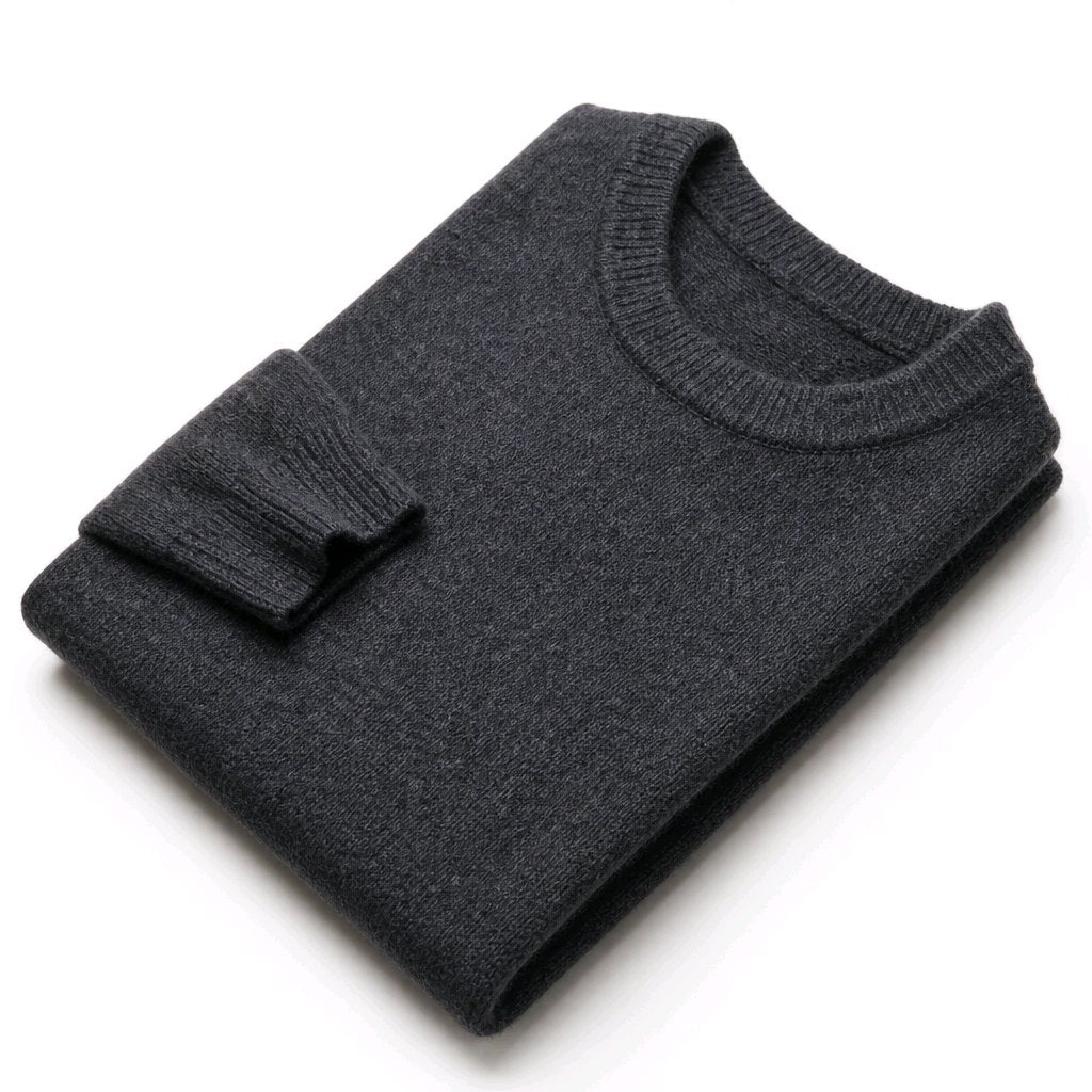 A dark charcoal gray folded knit sweater with a ribbed crew neck and folded cuff, shown on a clean white background.