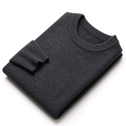 A dark charcoal gray folded knit sweater with a ribbed crew neck and folded cuff, shown on a clean white background.