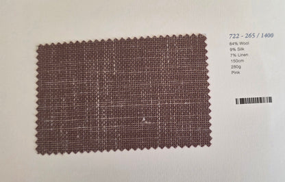 A fabric swatch card showing a textured woven material in a dusty mauve-pink color, with printed details on the right side including a barcode and composition text.