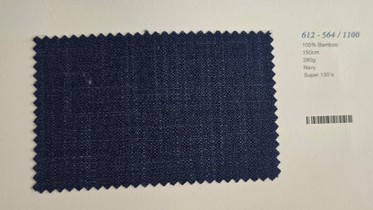 A fabric swatch of navy blue woven material with zigzag-cut edges, shown on a white background with printed product details in the upper right.