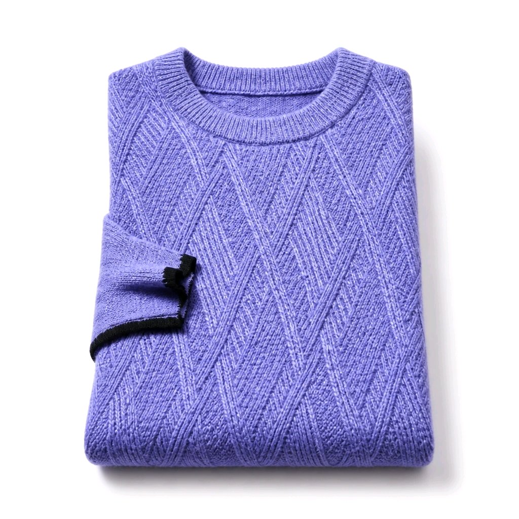 A folded lavender purple knit sweater with a textured diamond pattern and a black ribbed trim detail on the sleeve cuff, shown on a clean white background.