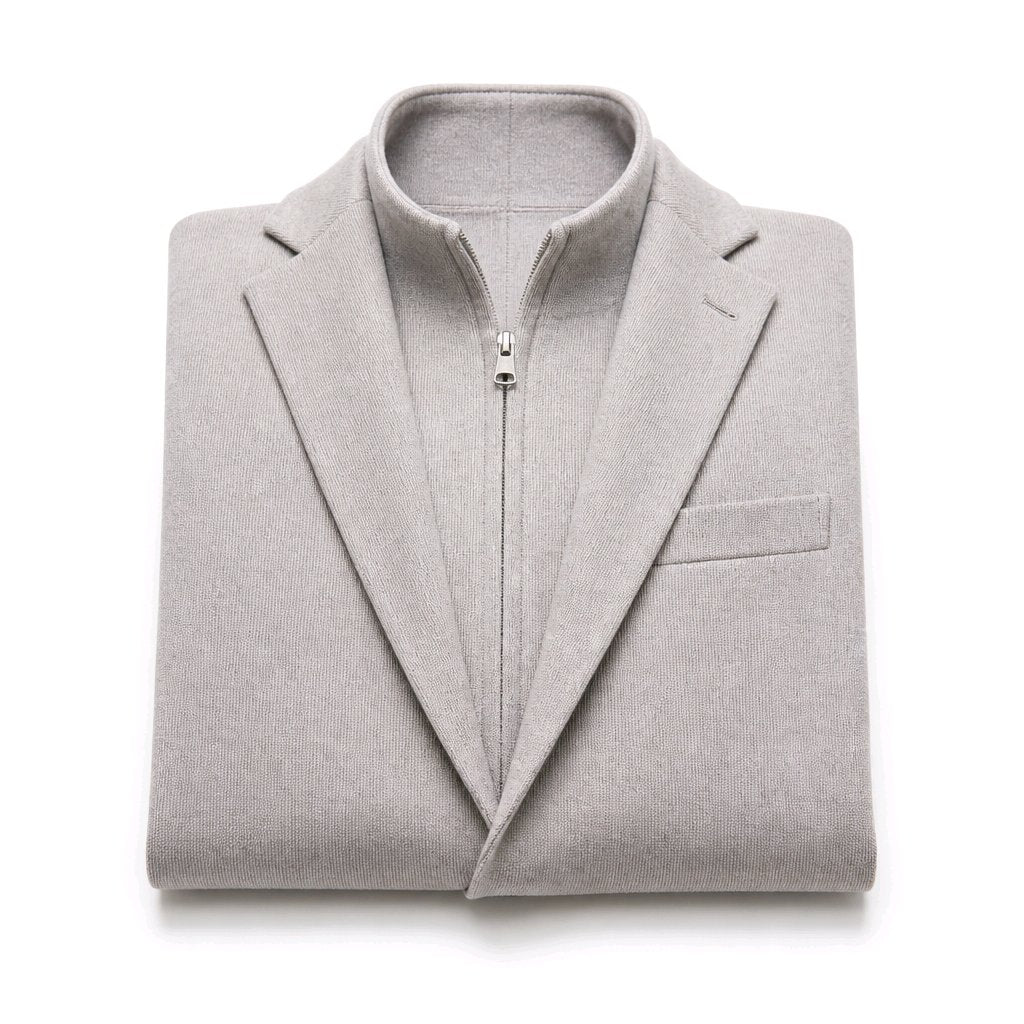 A folded light stone zip-up blazer with a stand collar, shown on a clean white background.