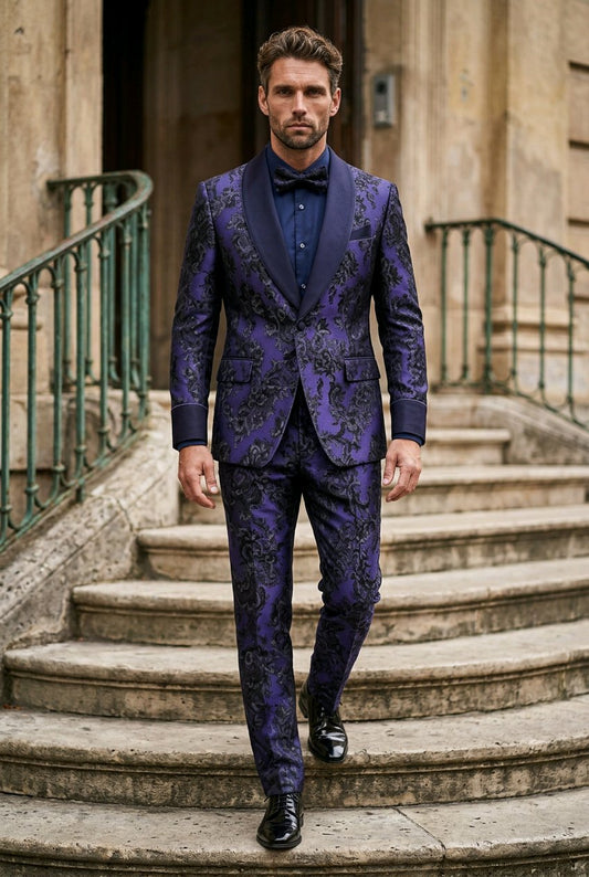 A man wearing a purple and black patterned suit with a dark purple shawl collar jacket and matching trousers, walking down stone stairs.