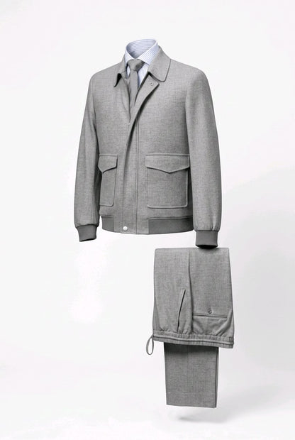 A men's light gray knit three-piece suit set, including a button-front jacket, matching trousers, and a collared shirt with a tie, displayed on a clean white background.