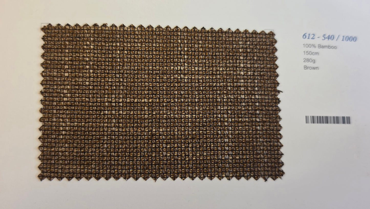 A rectangular woven bamboo fabric swatch in brown, displayed on a white background next to printed text with a barcode.