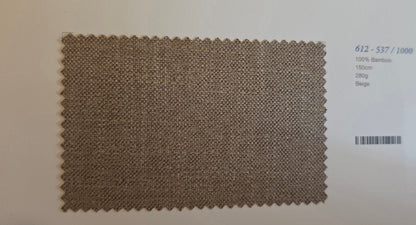 A rectangular woven fabric swatch in beige-brown bamboo texture with serrated zigzag edges, shown on a white background next to printed color/spec information.