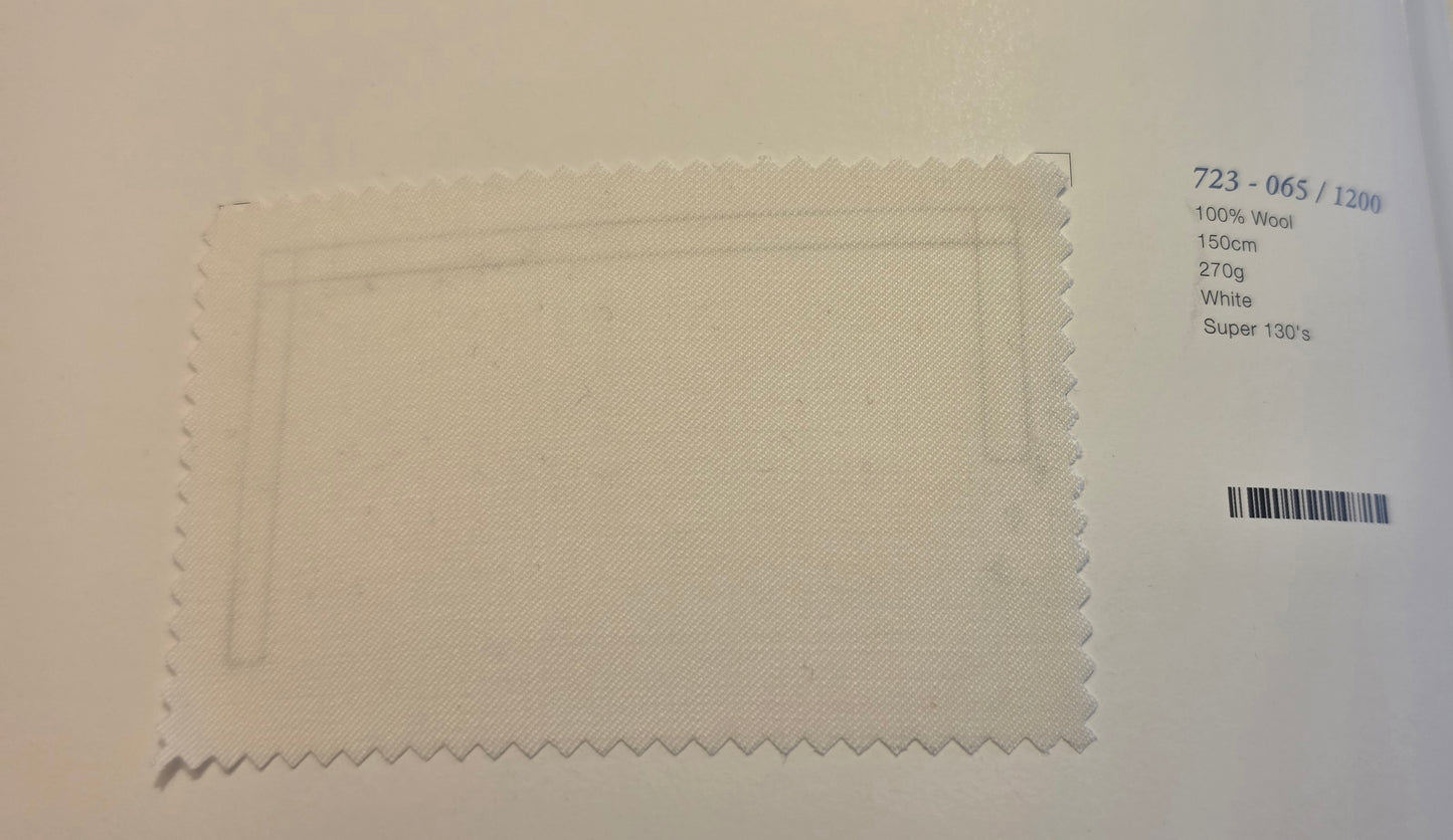 A square fabric swatch of off-white wool with serrated edges, displayed on a white background next to printed product details including '723 - 065 / 1200' and '100% Wool 1500m 270g White Super 130s'.