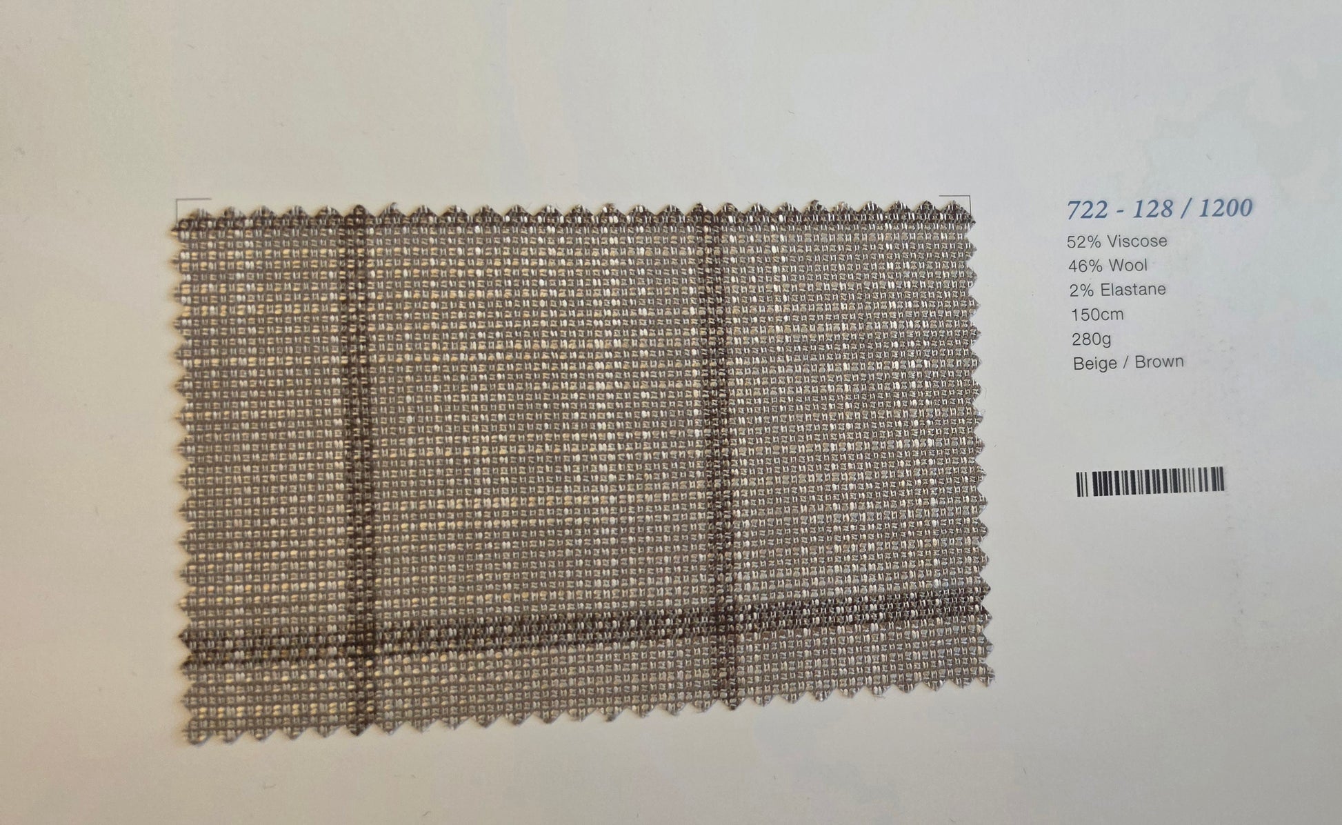 A woven fabric swatch showing a beige and brown plaid pattern, displayed on a white background with product details printed on the right.