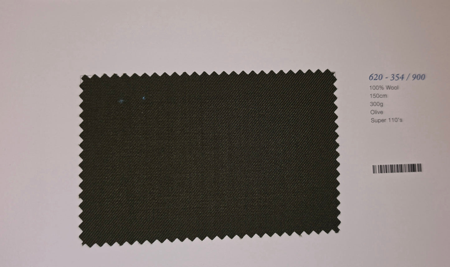 An olive green fabric swatch with serrated edges, displayed on a light background next to printed specifications.