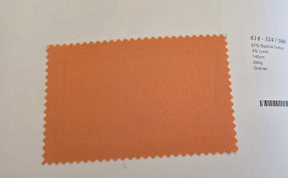 An orange fabric swatch with zigzag-cut edges displayed on a white background next to printed color information.