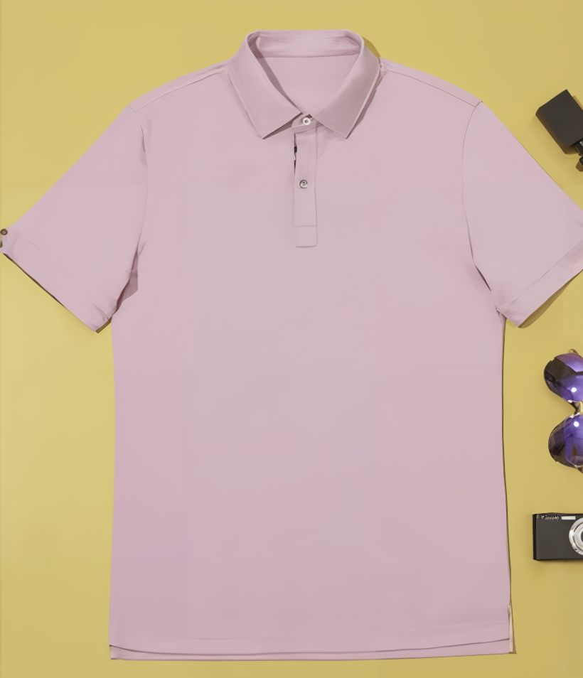 Pink polo shirt on a yellow background with sunglasses and a camera.