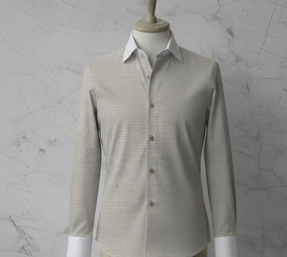 Beige textured shirt on a mannequin against a textured grey background