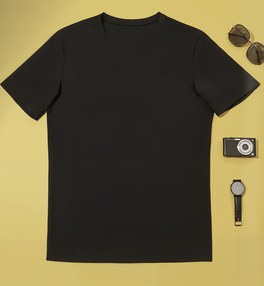 Black t-shirt on a yellow background with sunglasses, camera, and watch.