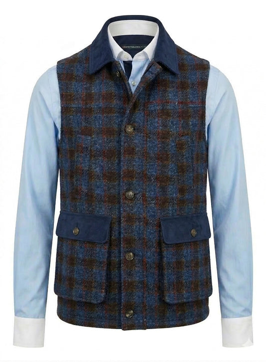 Blue and Red and  brown plaid vest over a light blue shirt on a white background