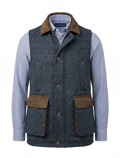 Blue tweed vest with brown accents over a striped shirt on a white background
