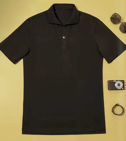 Brown polo shirt on a yellow background with sunglasses, camera, and belt.