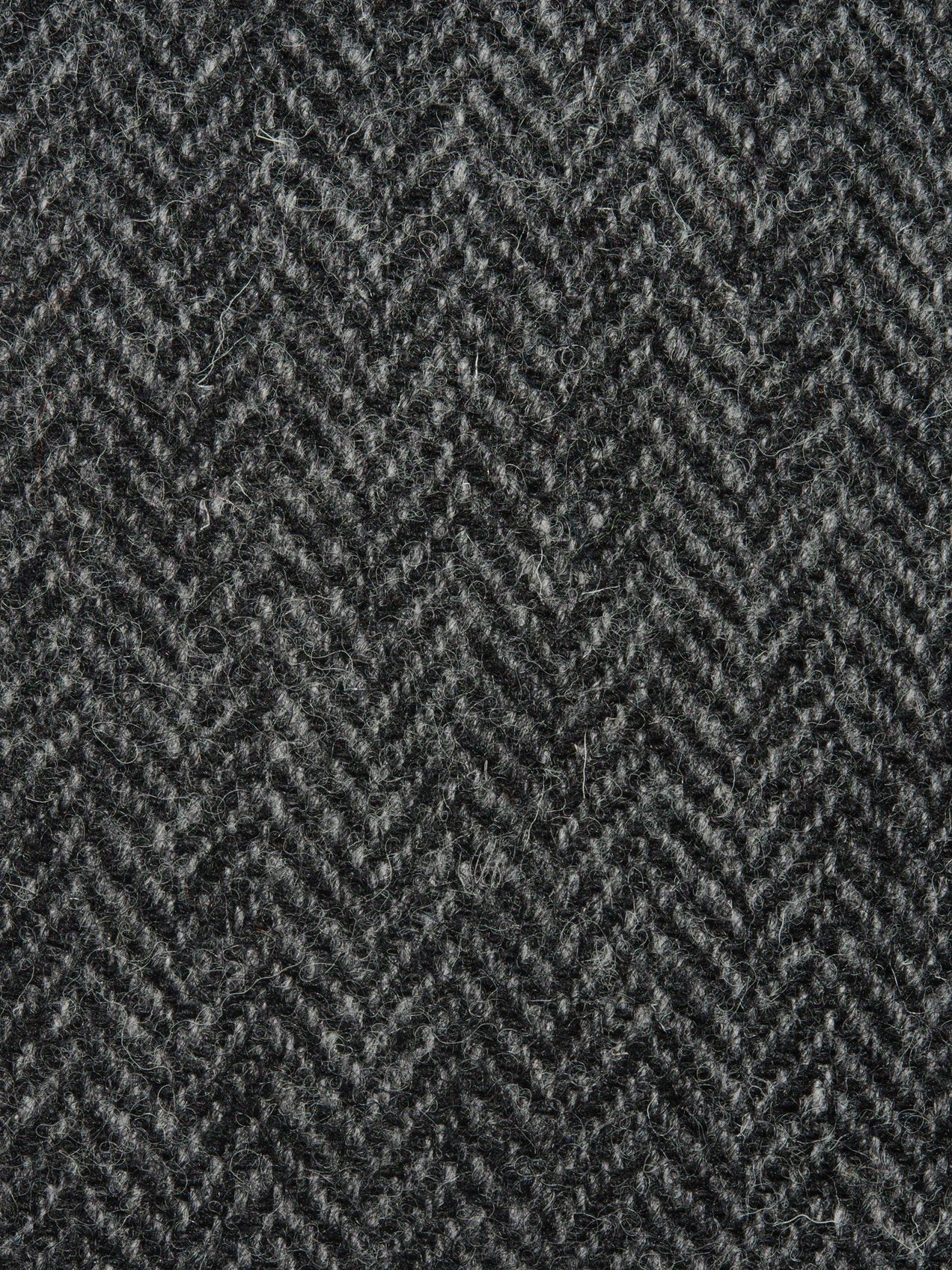 Close-up of a gray herringbone patterned fabric
