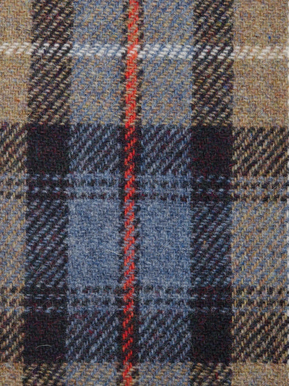 Close-up of a plaid fabric with blue, red, and beige colors.