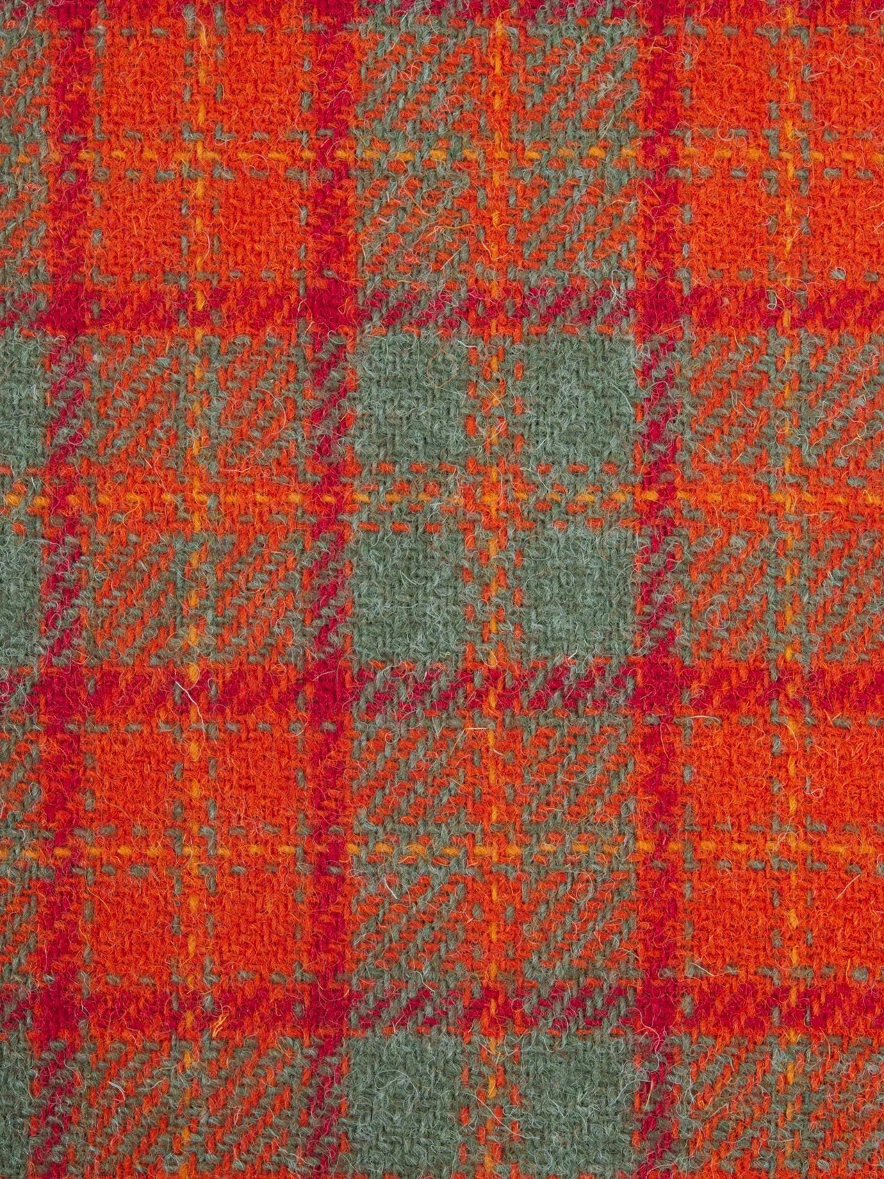 Close-up of a red and green plaid fabric pattern