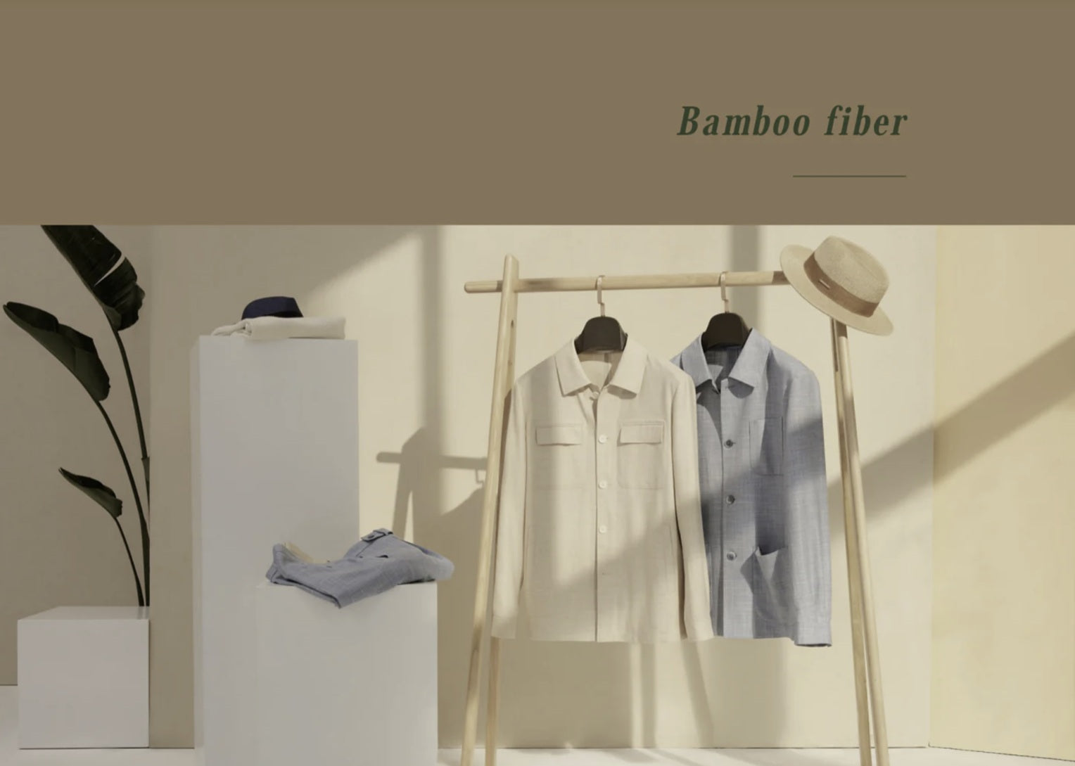 Clothing displayed on a rack with 'Bamboo fiber' text in a minimalistic setting.