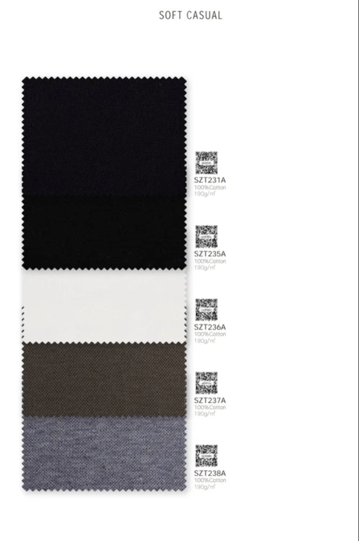Color swatch card with black, white, gray, and brown fabric samples on a white background.