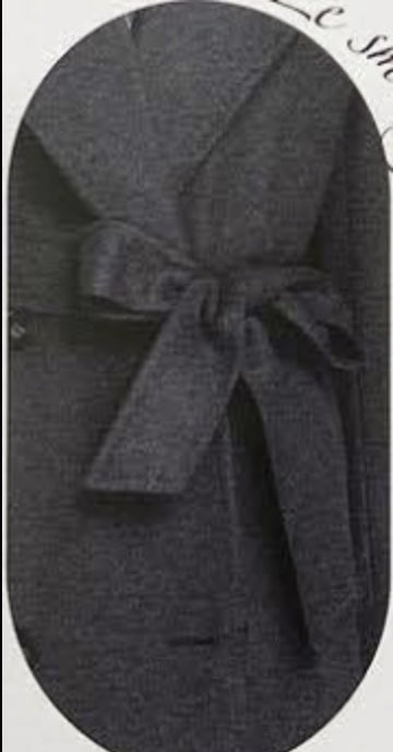 Dark grey beret with a bow on a light gray background