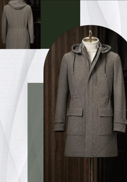Grey coat on a mannequin with a neutral background