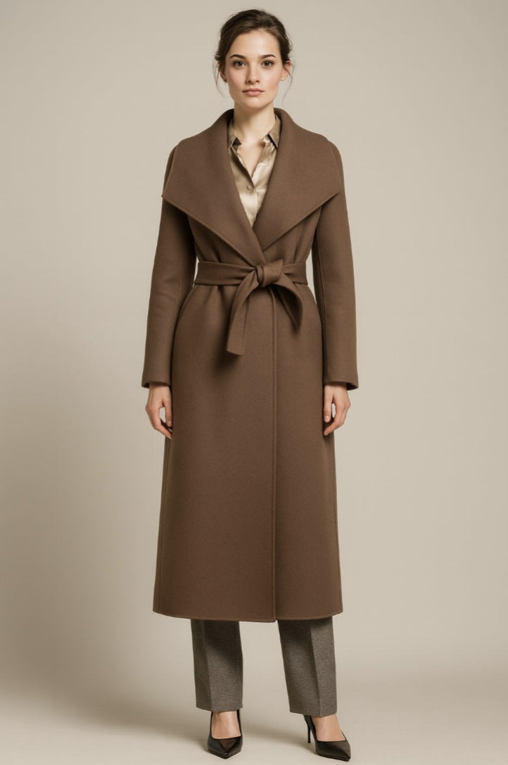 Lady wearing a brown coat with a belt on a beige background