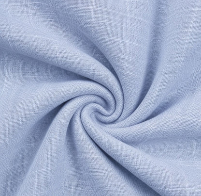 Light blue textured fabric with a subtle woven pattern, arranged in a spiral drape to show its softness and weave detail.