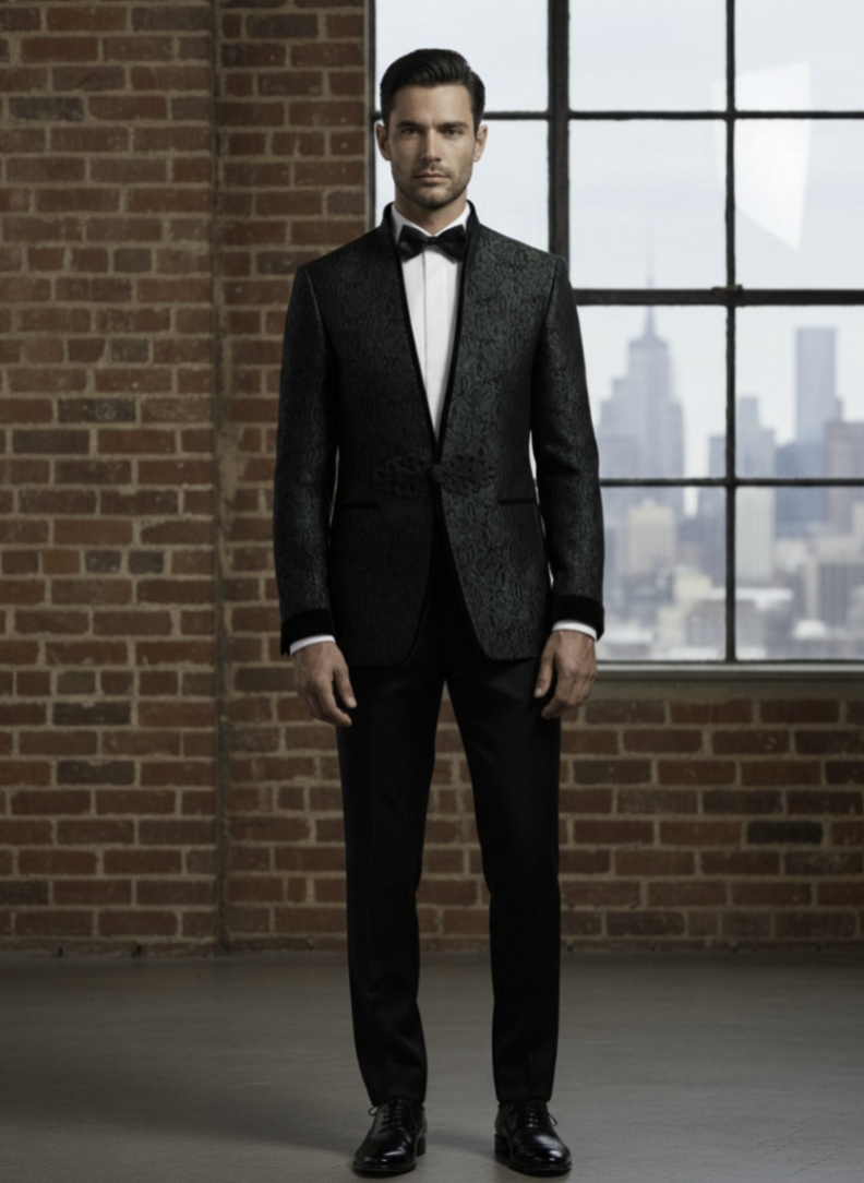 Man in a green and black suit standing in front of a brick wall with a cityscape view.