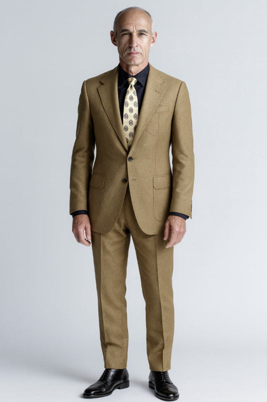 Man wearing a brown suit with a white background