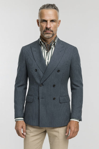 Man wearing a double-breasted blazer with a white background