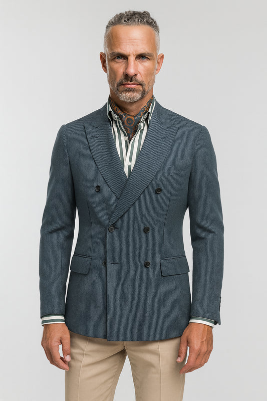 Man wearing a double-breasted blazer with a white background