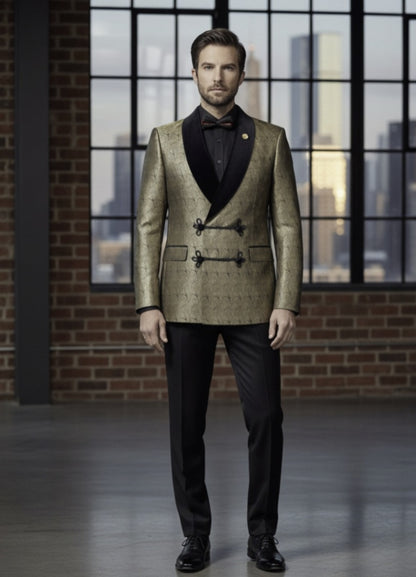 Man wearing a gold blazer and black pants standing in front of a large window with cityscape view.