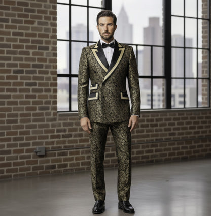 Man wearing a patterned suit standing in front of large windows with a cityscape view.