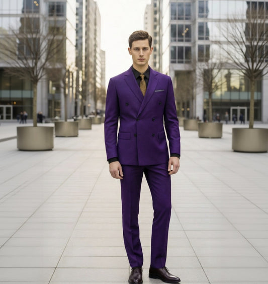 Man wearing a purple suit standing in an urban setting with modern 