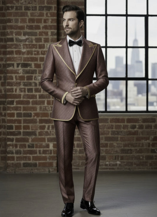 Man wearing a red and cerise  with gold trim against a brick wall and window background