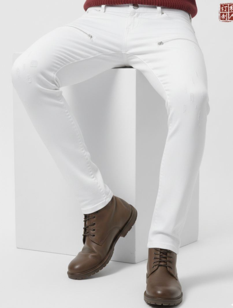 White pants worn by a person with brown shoes on a white background