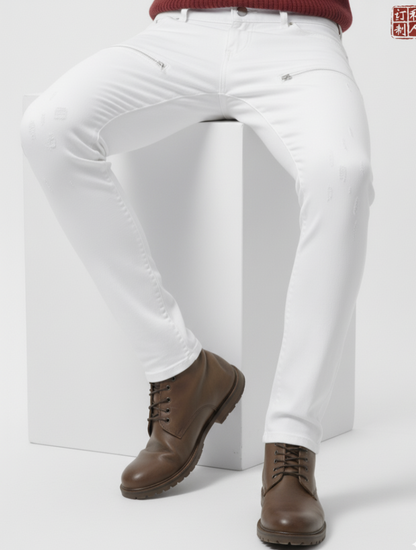 White pants worn by a person with brown shoes on a white background